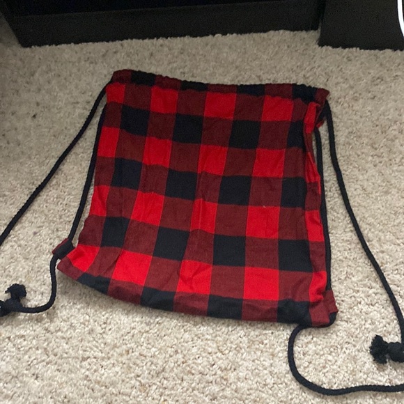 black and red plaid, jaw string bag. - Picture 1 of 2
